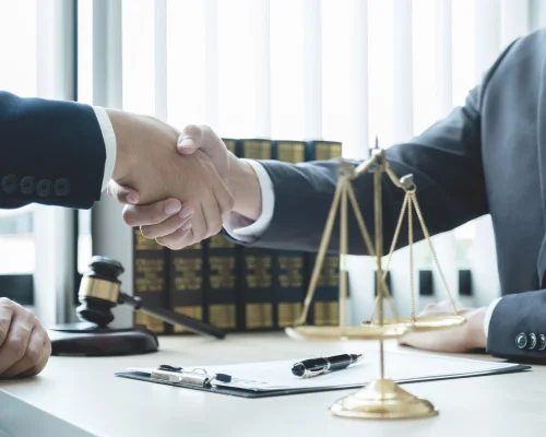 handshake-after-lawyer-providing-legal-consult-business-dispute-service-to-the-man-at-the-office.jpg